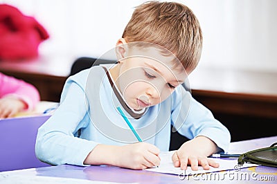 Child boy studying writing Stock Photo