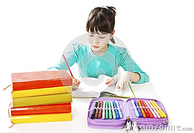 Child with broken arm in classroom, studio shoot Stock Photo