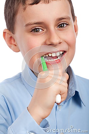 Child brushing his teeth Stock Photo