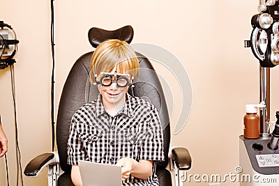 Child checking vision using specialized glasses Stock Photo