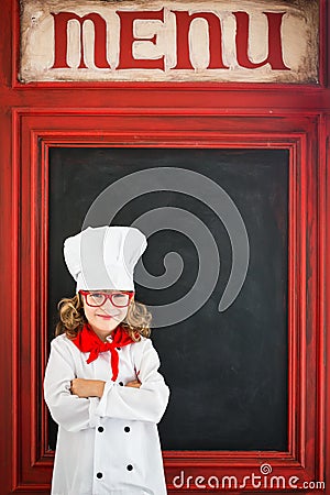 Child chef cook. Restaurant business concept Stock Photo