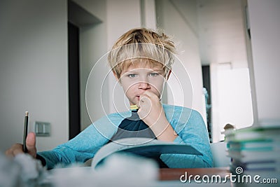Child chewing on clothes, stress, anxiety, mental problems Stock Photo
