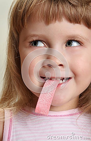 Child with chewing gum Stock Photo