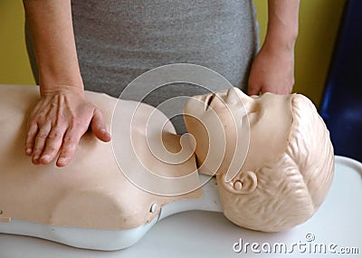 Child choking sternum pressure procedure Stock Photo