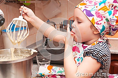 Child cooking at home Stock Photo