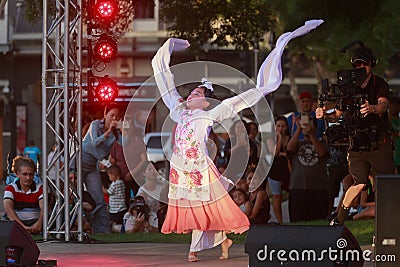 Young girl performs Chinese sleeve dance on stage Editorial Stock Photo