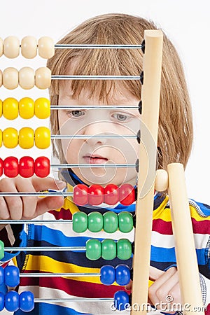 Child Counting on Colorful Wooden Abacus Stock Photo