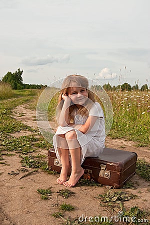 Child in countryside Stock Photo