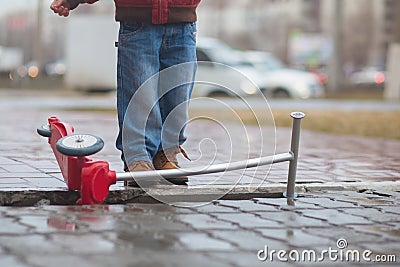 child danger on the road. poor operating conditions. Stock Photo