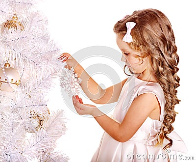 Child decorate Christmas tree . Stock Photo