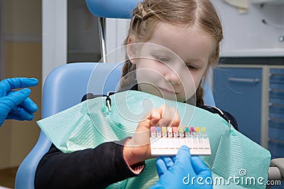 The child dental picks colored fillings Stock Photo