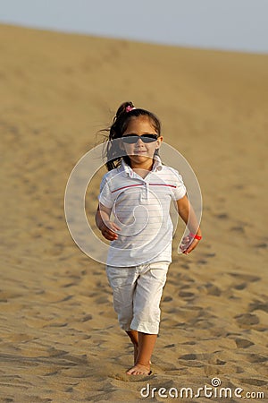 Child in desert Stock Photo