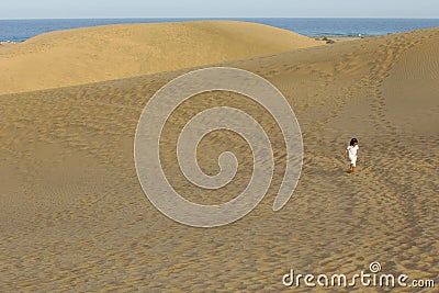 Child in desert Stock Photo