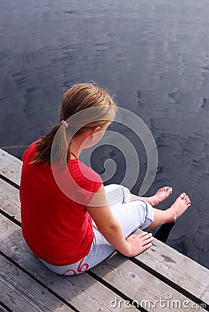 child on dock stock image - image: 17802041