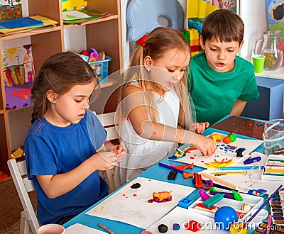 Child dough play in school. Plasticine for children. Stock Photo