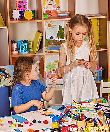 Child dough play in school. Plasticine for children. Stock Photo