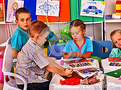 Child dough play in school. Plasticine for children. Stock Photo