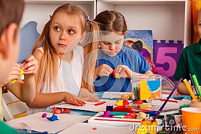 Child dough play in school. Plasticine for children. Stock Photo