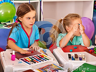 Child dough play in school. Plasticine for children. Stock Photo