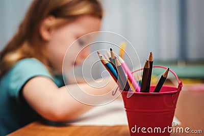 child draw with color crayons Stock Photo