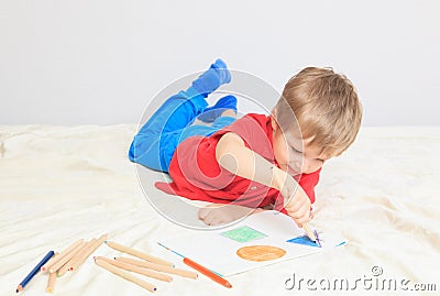 Child drawing shapes Stock Photo