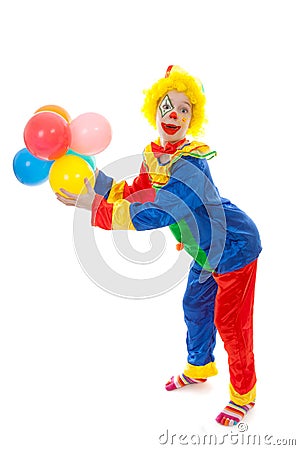 Child dressed as colorful funny clown Stock Photo