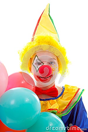 Child dressed as colorful funny clown Stock Photo