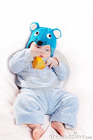 Child dressed as a mouse with cheese Stock Photo