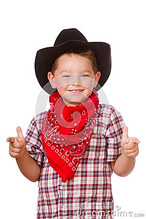 Child dressed up as cowboy playing Stock Photo