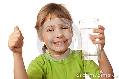 Child drink water from glass container Stock Photo