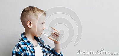 Child drinks pure water Stock Photo