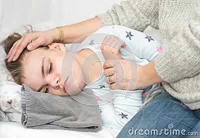 A child with epilepsy during a seizure Stock Photo