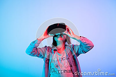 Child experimenting with virtual reality headset Stock Photo