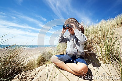 Child explorer at the beach Stock Photo