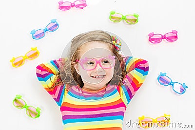 Child at eye sight test. Kid at optitian. Eyewear for kids. Stock Photo