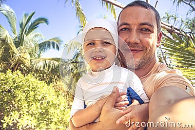 Child father family selfie portrait summer beach vacation happy parenting lifestyle Stock Photo