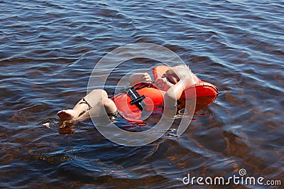 Child floating with life vest Stock Photo