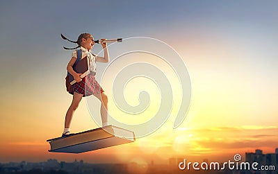 Child flying on the book Stock Photo