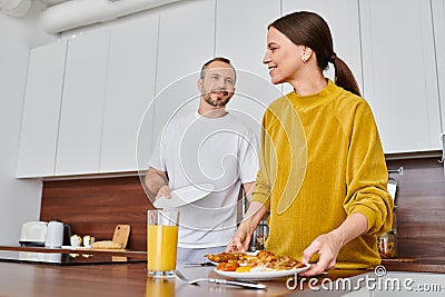 child-free couple serving delicious breakfast Stock Photo