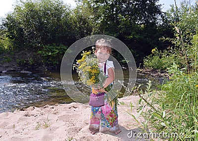 Child fun summer n green landscape childhood children adorable happy baby kid cute little nature outdoors young autumn toddler wat Stock Photo