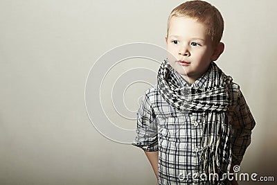 Child. funny little boy in scurf. Fashion Children. 4 years old. plaid shirt Stock Photo