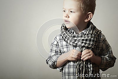 Child. funny little boy in scurf. Fashion Children. 4 years old. plaid shirt Stock Photo