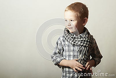 Child. funny little boy in scurf. Fashion Children. 4 years old. plaid shirt Stock Photo