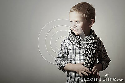 Child. funny little boy in scurf. Fashion Children. 4 years old. plaid shirt Stock Photo