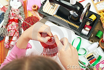 Child girl knit, hand closeup, handmade and handicraft concept Stock Photo