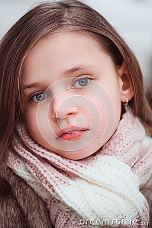 Child girl portrait on cozy warm outdoor winter walk Stock Photo