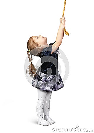 Child girl pulling a rope from top, isolated on white Stock Photo