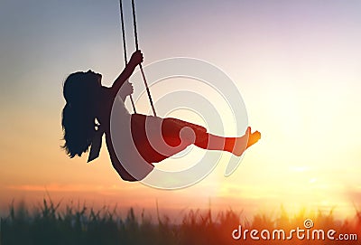 Child girl on swing Stock Photo