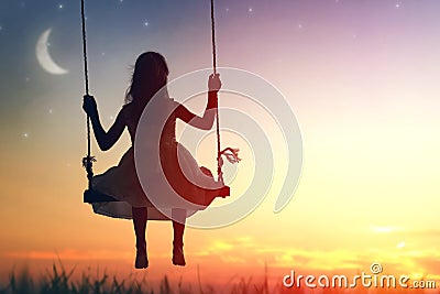 Child girl on swing Stock Photo