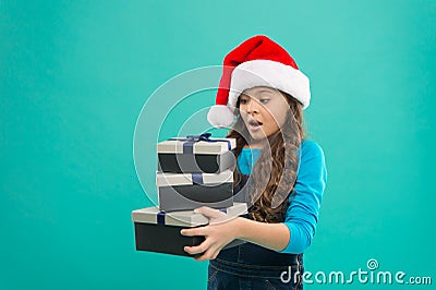 Child got surprise gift. Happy new year. Packaging for gifts. Lot presents. Christmas celebrated throughout globe. Small Stock Photo